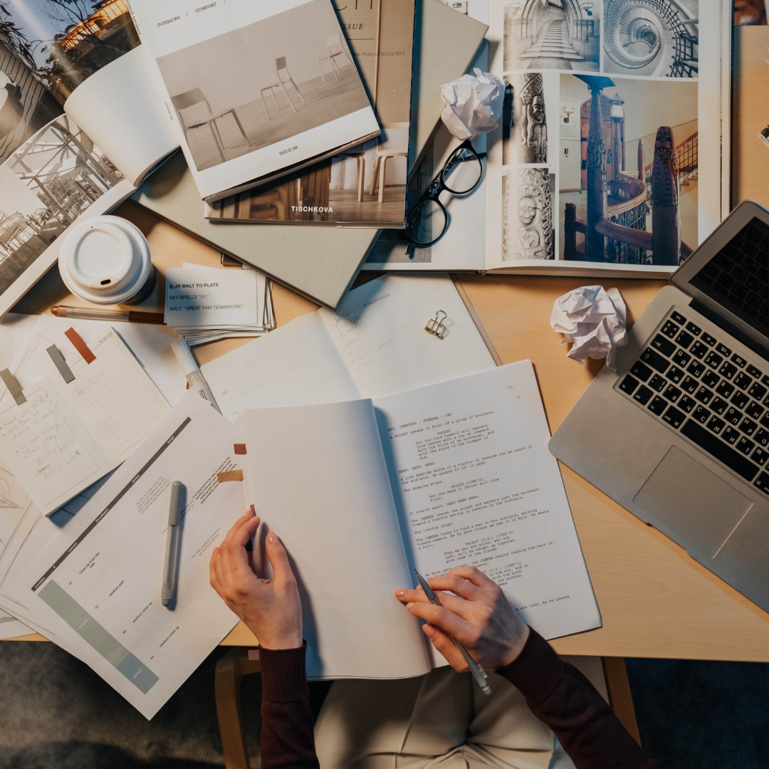 A photo of a person hardworkingly finishing her dissertation