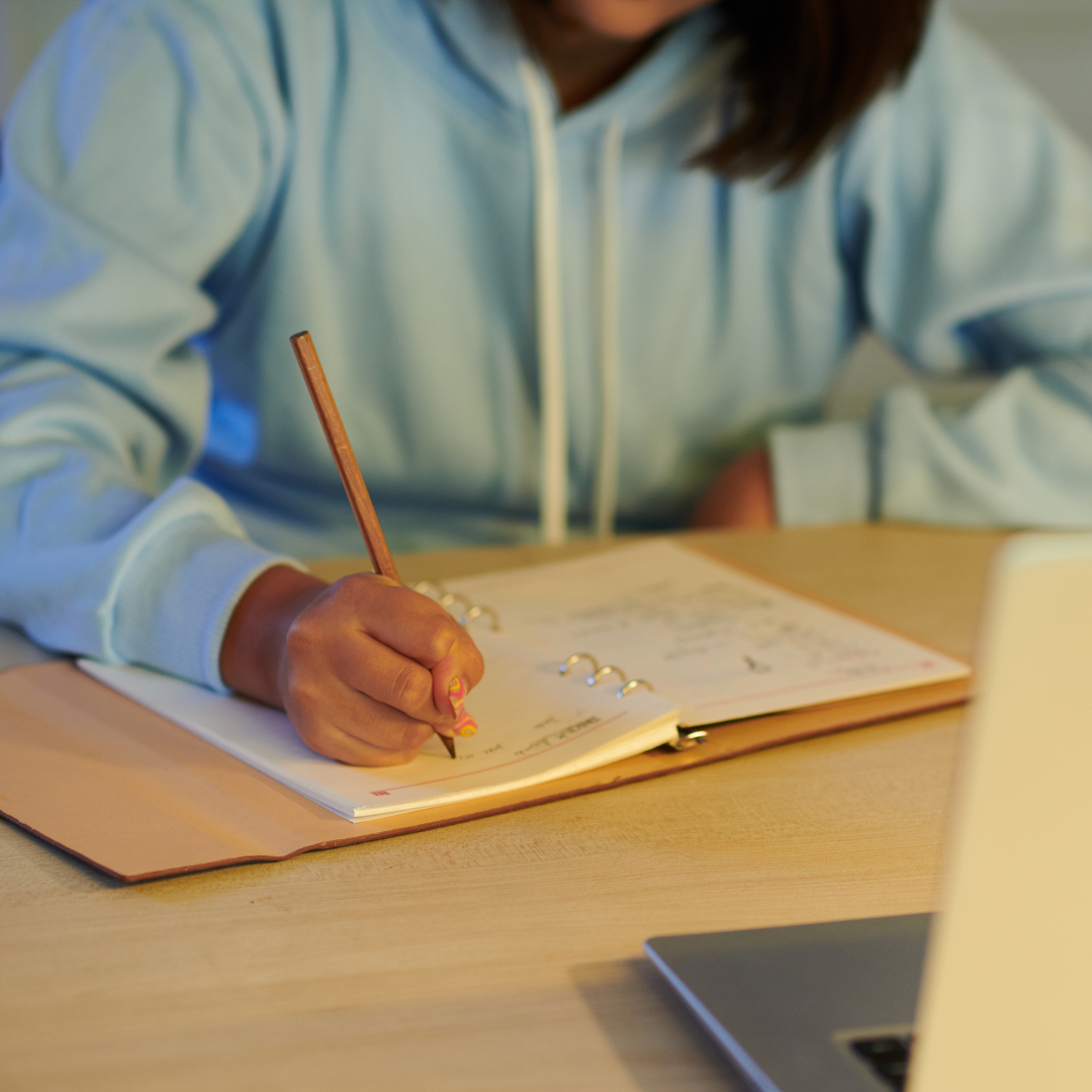 A writer writing an essay