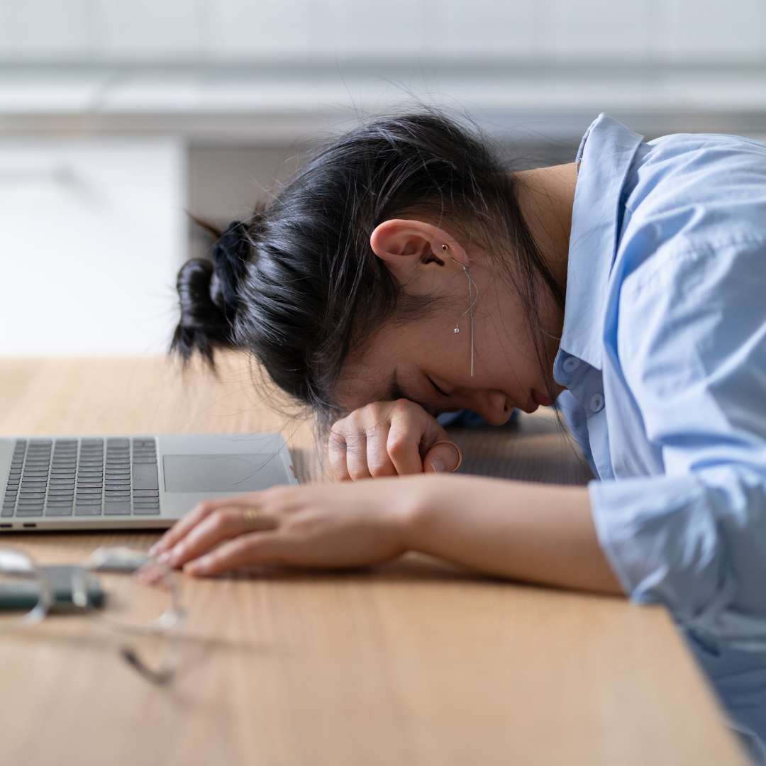 10 Fatal Mistakes Aspiring Authors Make Frustrated first-time author surrounded by drafts, struggling to finish a business book.