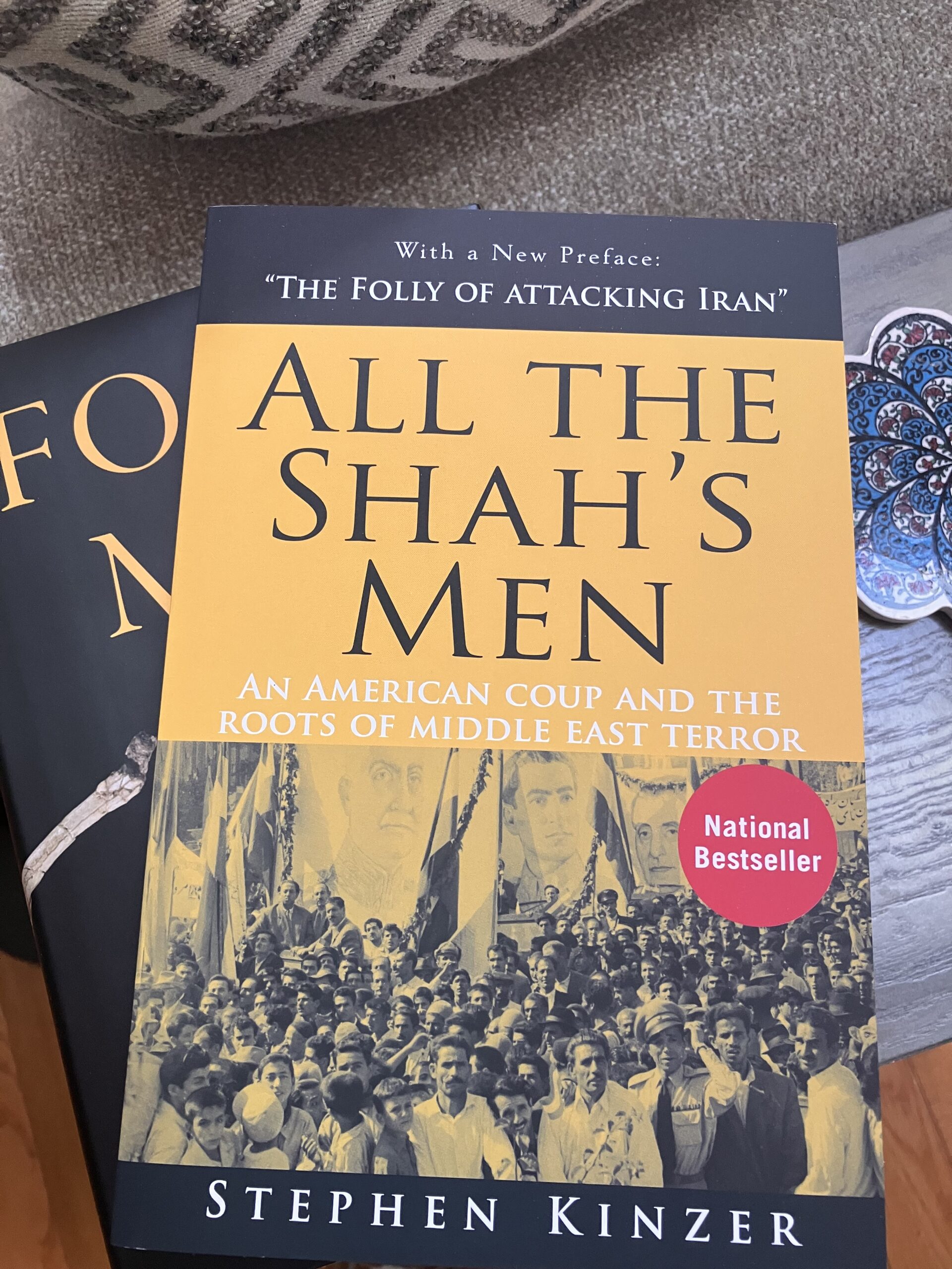 A photo of the book I'm reading now, All The Shah's Men